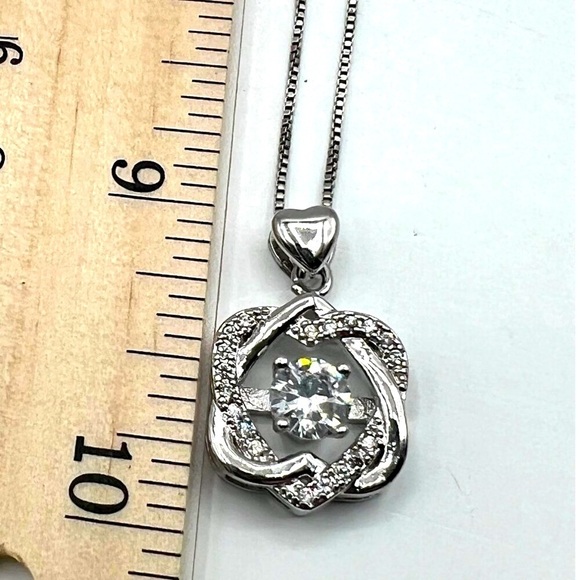 Sterling Silver Heart & Knot Pendant Necklace With Sparkling Cubic Zirconia - Picture 9 of 10
